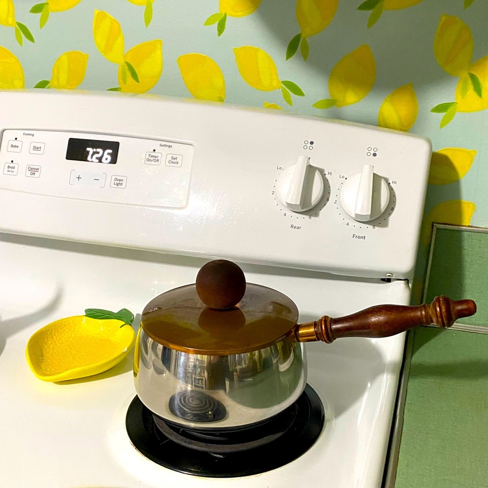 Vintage stainless steel sauce pan with copper and wood lid fondue pot